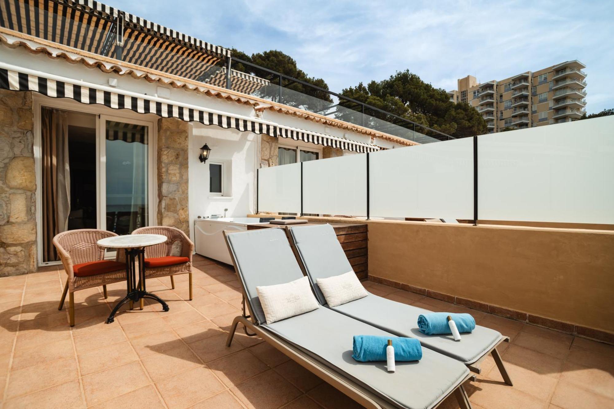 Secrets Mallorca Villamil Resort & Spa - Adults Only 帕格拉 外观 照片 Terrace of a suite
